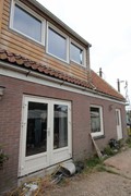Monnickendammerrijweg 51, 1452 PN Ilpendam - Zijaanzicht met openslaande deuren