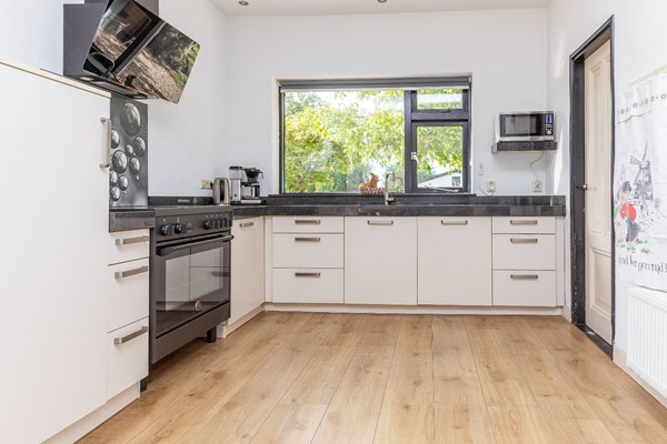 Medium property photo - Burgemeester Houtkoperweg 44, 4033 BL Lienden