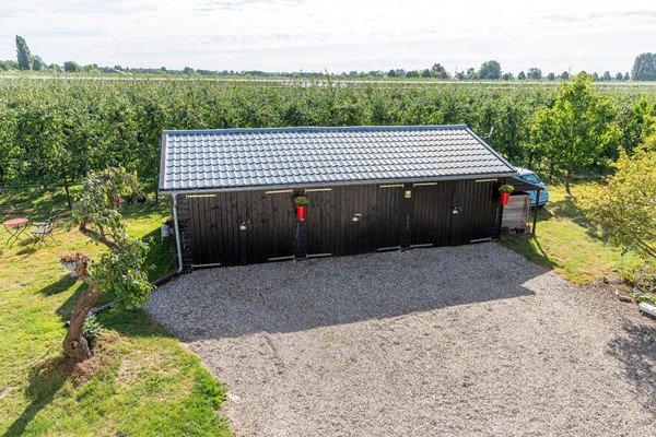 Medium property photo - Burgemeester Houtkoperweg 44, 4033 BL Lienden