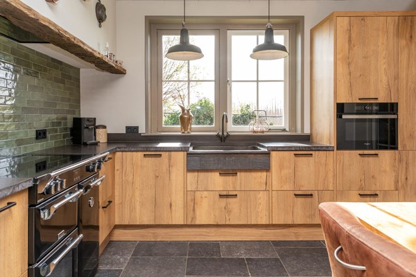 Te koop: Fraaie woning met loods (agrarisch bestemming) op 6030 m² grond!