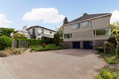 Te koop: Ruime halfvrijstaande woning met 4 woonlagen, ruime inpandige garage en zonnige tuin op toplocatie aan de Molenberglaan