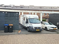 Foto met camper op de oprit - 2.jpg