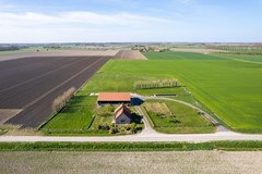 Te koop: Vrijstaande woning met schuur op ruim 14.000 m2 eigen grond.