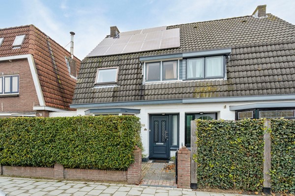Verkocht: Twee-onder-een-kapwoning met super riante achtertuin in Leerdam-West!