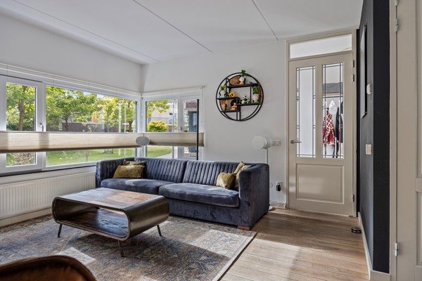 Foto - Te koop: Royale geschakelde twee- onder -een kapwoning!