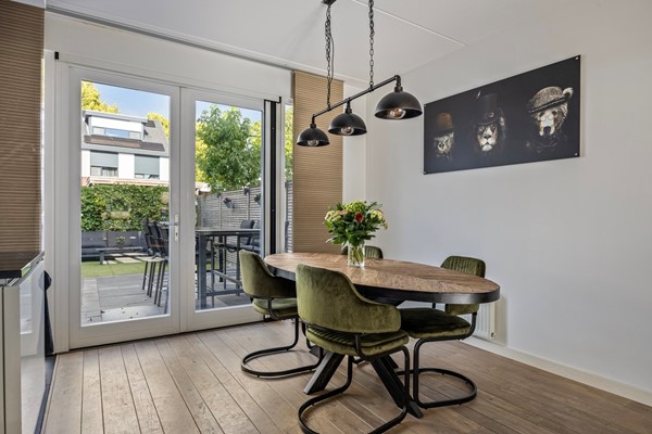Foto - Te koop: Royale geschakelde twee- onder -een kapwoning!