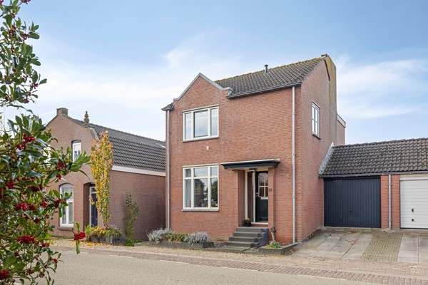 Foto - Te koop: Wonen op een fijne locatie met uitzicht op de molen!
