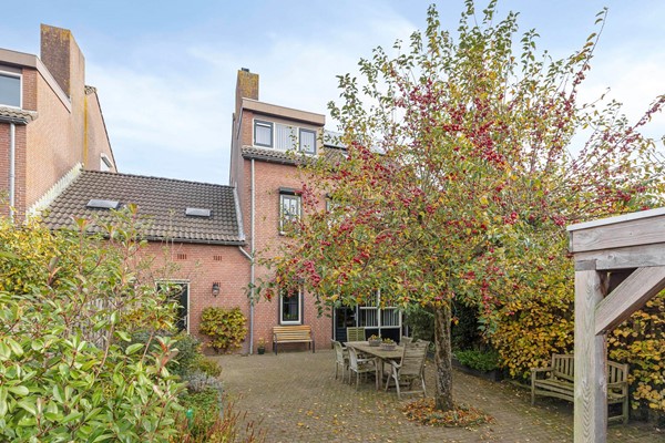 Foto - Te koop: Wonen op een fijne locatie met uitzicht op de molen!
