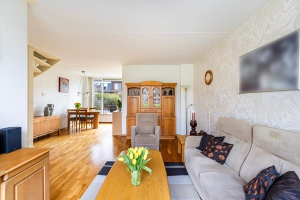 Foto - Te koop: Tussenwoning gelegen aan groenvoorziening