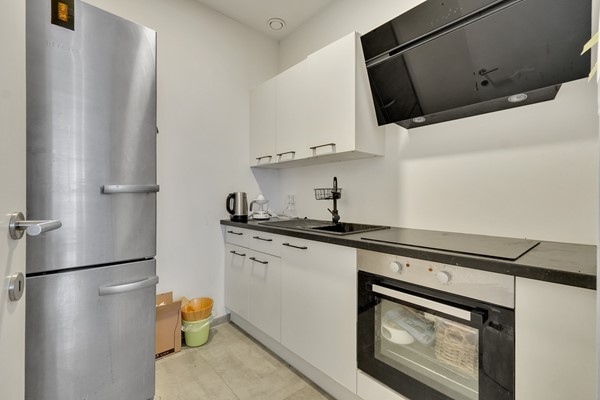 Foto - Te koop: Veelzijdig handelspand in hartje Lanaken waar wonen, werken en leven samenkomen onder één dak!
