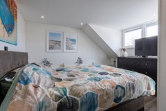 Foto_Spaaij Makelaars - Pr. Beatrixlaan 7 Bergen op Zoom grote slaapkamer (3).jpeg