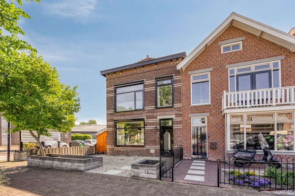 Te koop: Verrassend ruime, compleet gerenoveerde hoekwoning met royale tuin aan Burgemeester de Bruïnelaan in Zwijndrecht!