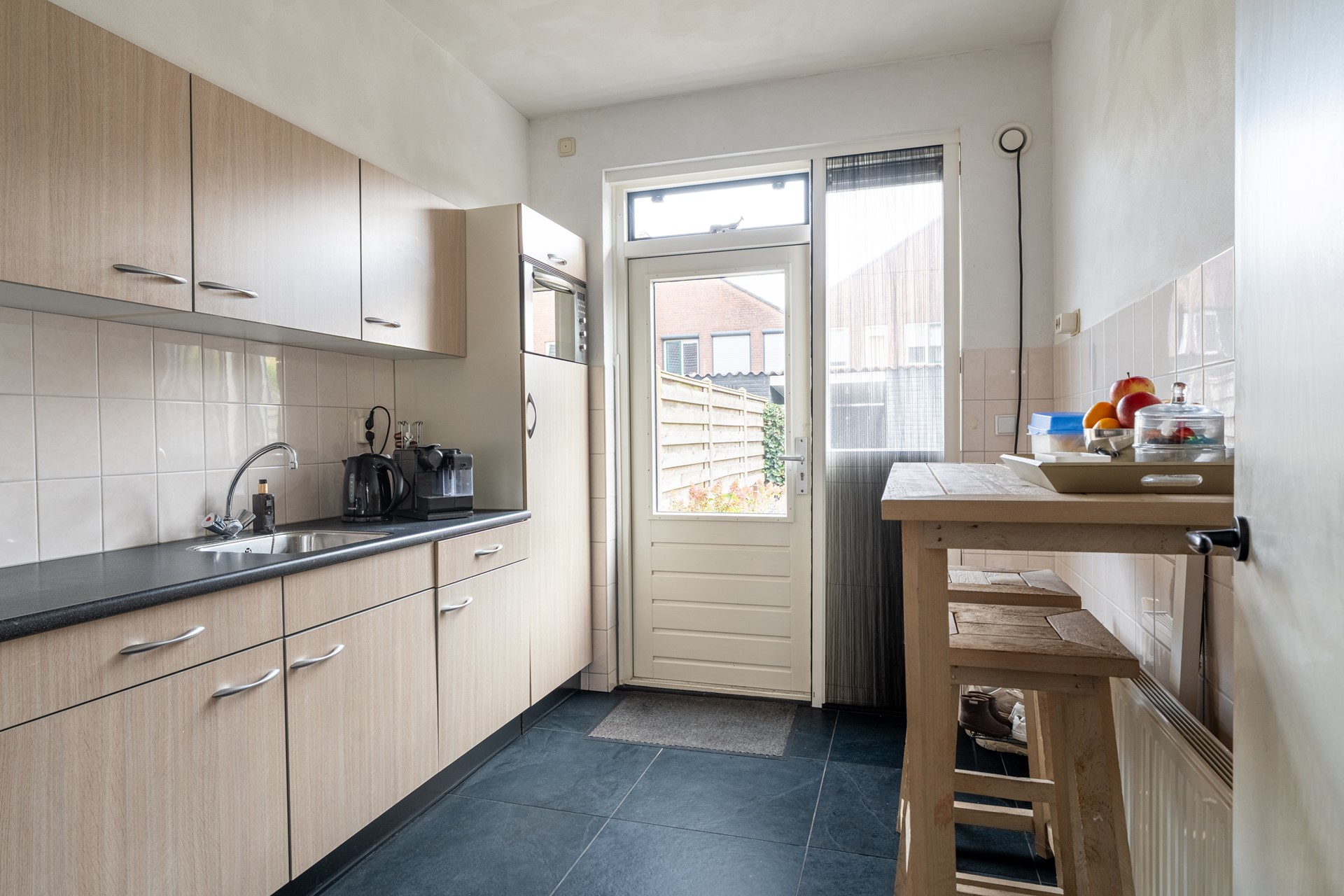 Tussenwoning te koop: Trampad 19, Sprang-Capelle
