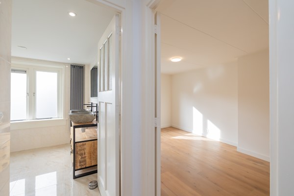 Medium property photo - van Limburg Stirumstraat 27B, 2201 JM Noordwijk