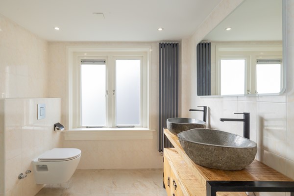 Medium property photo - van Limburg Stirumstraat 27B, 2201 JM Noordwijk