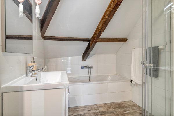 Medium property photo - Baambruggestraat 125, 2546 SJ Den Haag
