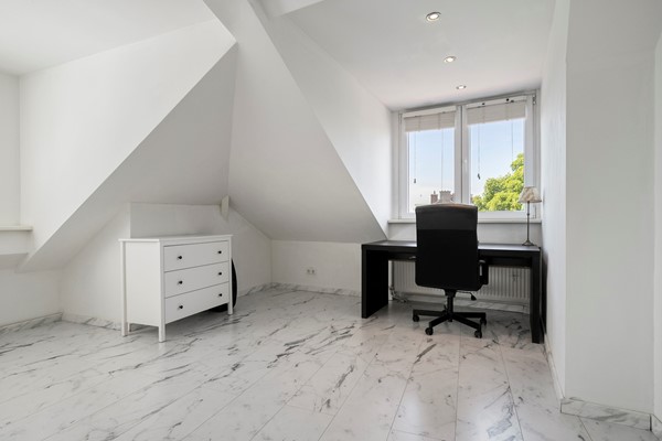 Medium property photo - Baambruggestraat 125, 2546 SJ Den Haag