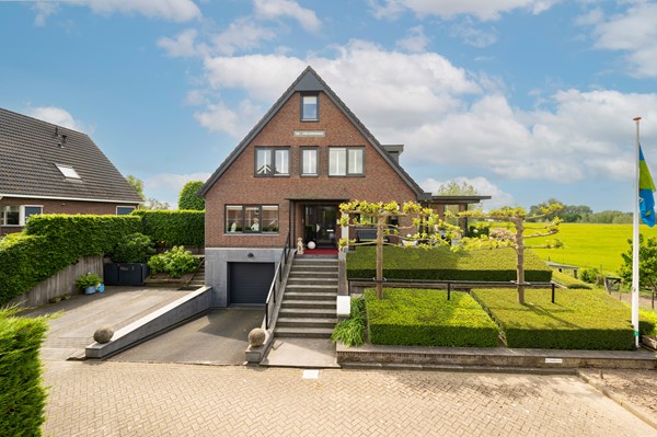 Verkocht: Exclusieve Dijkvilla met rivierzicht