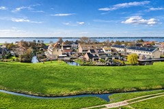 Achterzijde woning vanaf afstand.jpg