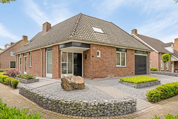 Te koop: Ervaar de warme sfeer en mooie afwerking van deze vrijstaande woning met energielabel A!