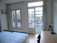 Slaapkamer 1 met toegang balkon